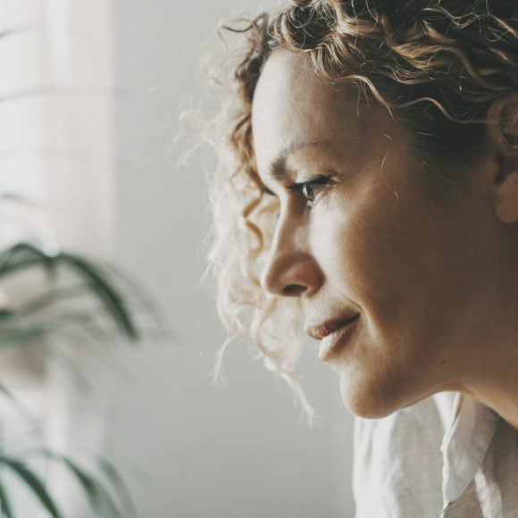 A woman thinking about her health and wellness